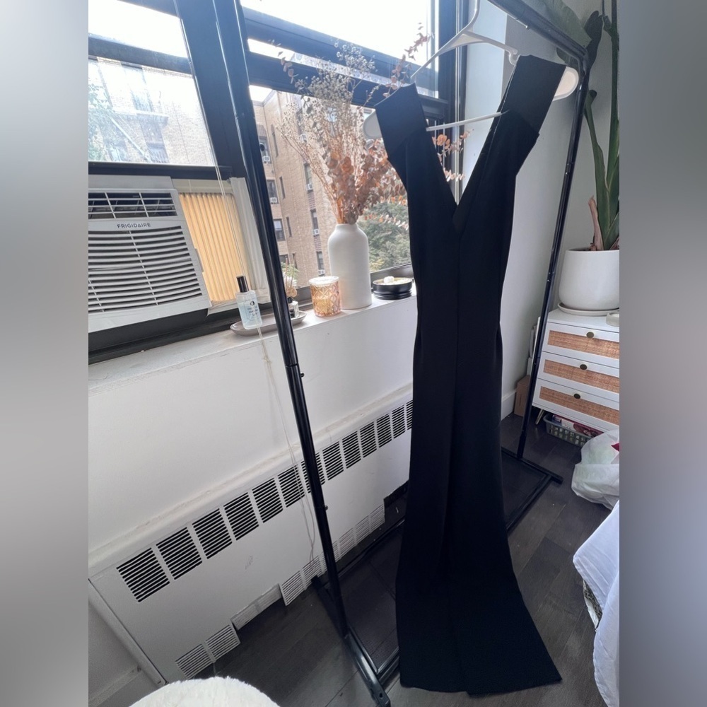 Long wide legged flattering jumpsuit with open back